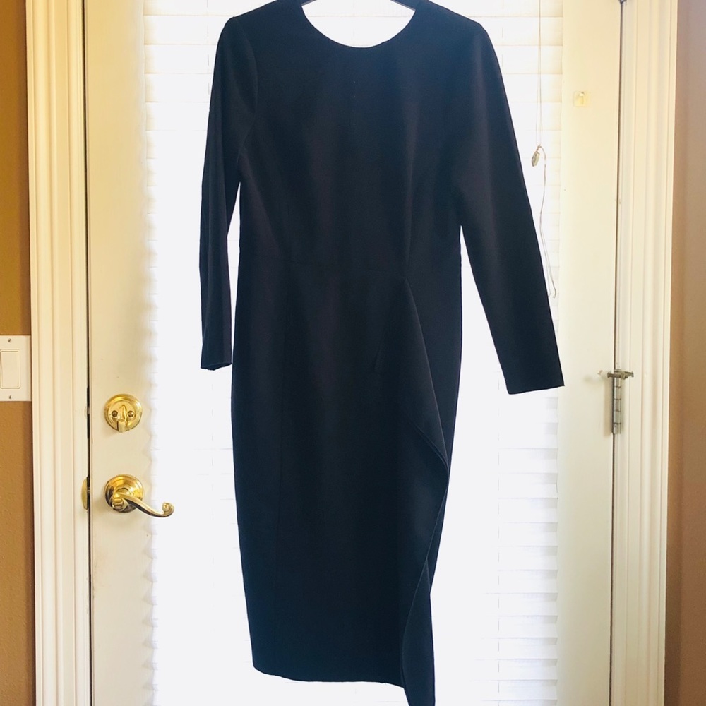 HM sleek black dress with ruffle